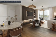 Open-plan kitchen and dining area with island at Brickmark Place, Bracknell