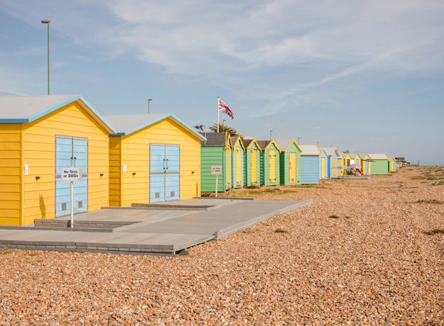Colourful beach huts along the seafront