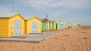 Colourful beach huts along the seafront
