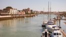 Marina with boats and waterfront houses