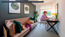 Stylish home office in the Sunningdale Park show home in Ascot, with a desk, sofa and contemporary interior design.