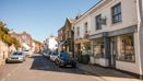 Town centre street lined with shops and businesses