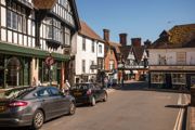 Historic town centre street with shops and traditional buildings