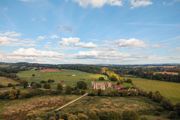 Countryside landscape with rolling green fields