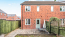 Rear garden with paved patio, outdoor seating and fenced boundaries.