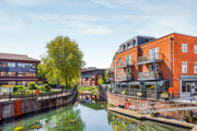 Picturesque canalside setting with waterside restaurants and shops
