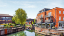 Picturesque canalside setting with waterside restaurants and shops