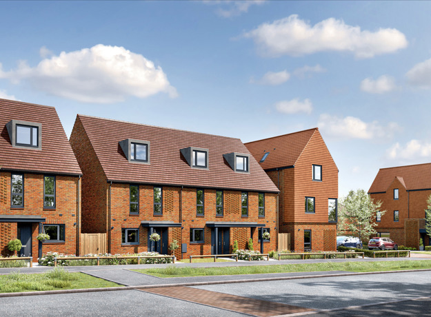 Plots 85 91 Modern red-brick townhouses along a quiet residential street under a blue sky.