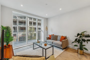 Bright living room with balcony doors in the Horlicks Quarter show home in Slough