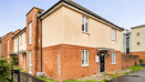 End-of-terrace house with brick and rendered exterior beside a footpath.
