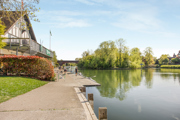Peaceful riverside walk with attractive waterside scenery